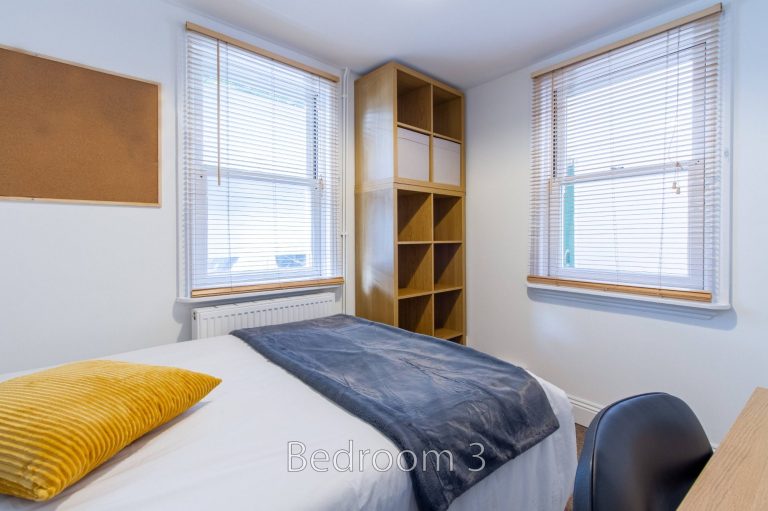 Bedroom 3 at 5 St Pauls Lane with ample storage and natural light.